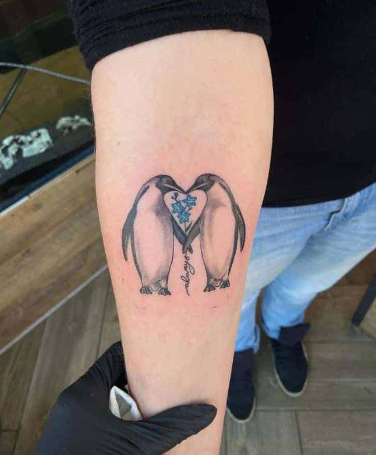 Simple black and gray penguin tattoos 4
