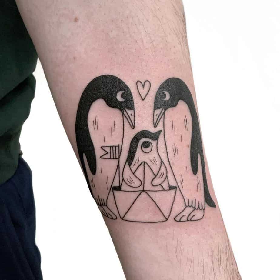 Simple black and gray penguin tattoos 6