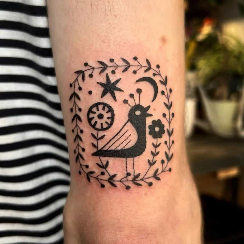 Singing bird tattoo