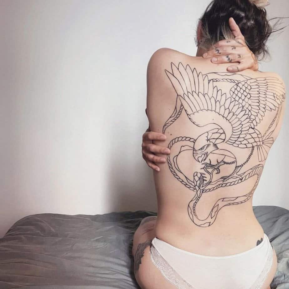 Fine-line back tattoo idea