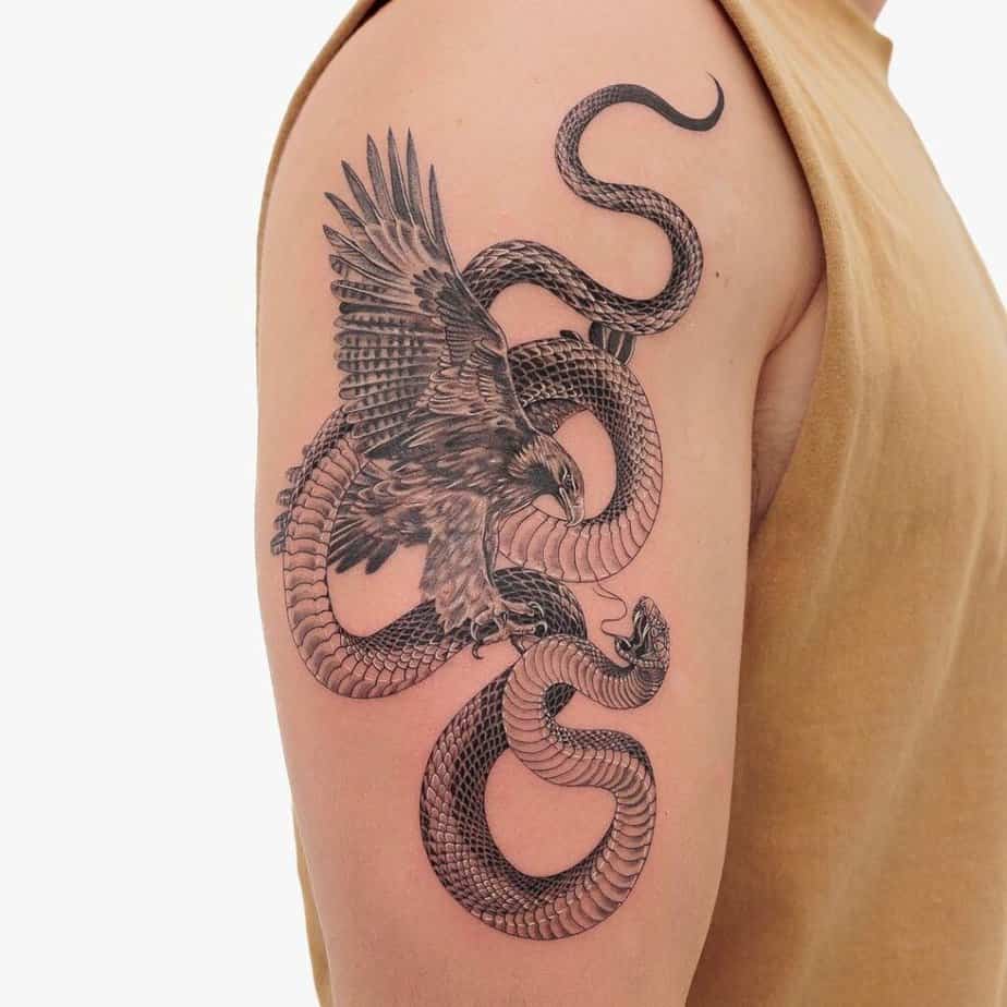 Arm realistic snake and eagle
