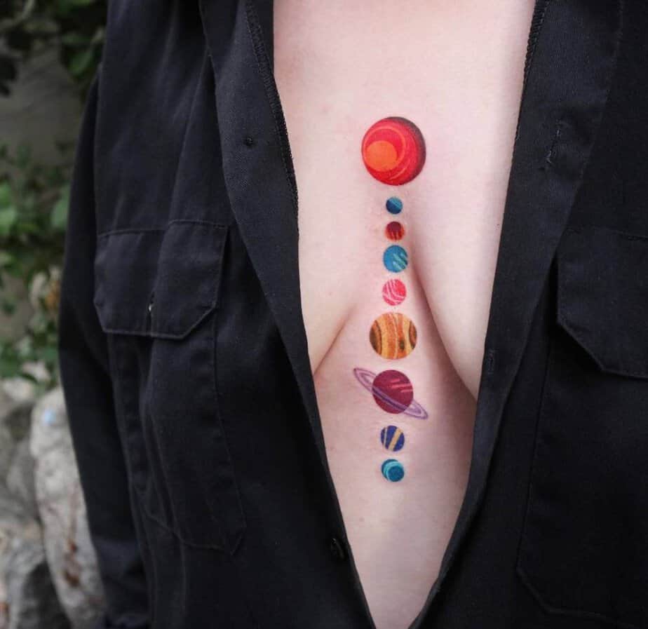 Solar system sternum tattoo