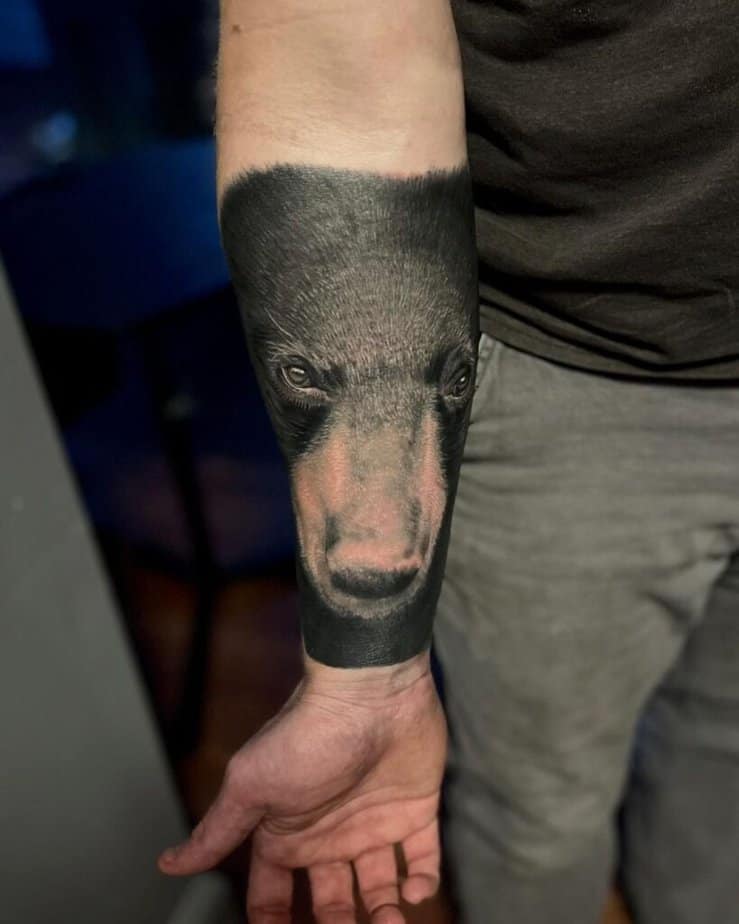 3. A realistic bear on the forearm