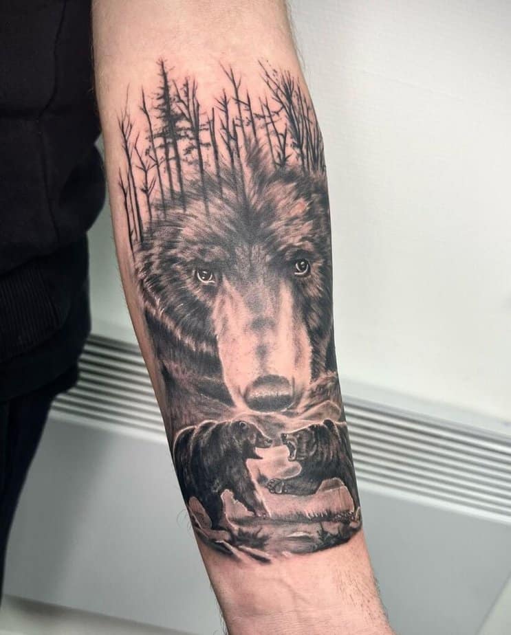 4. A black and gray tattoo of two bears fighting