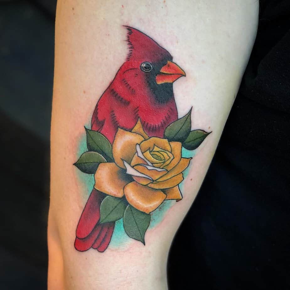 Vibrant cardinal tattoo
