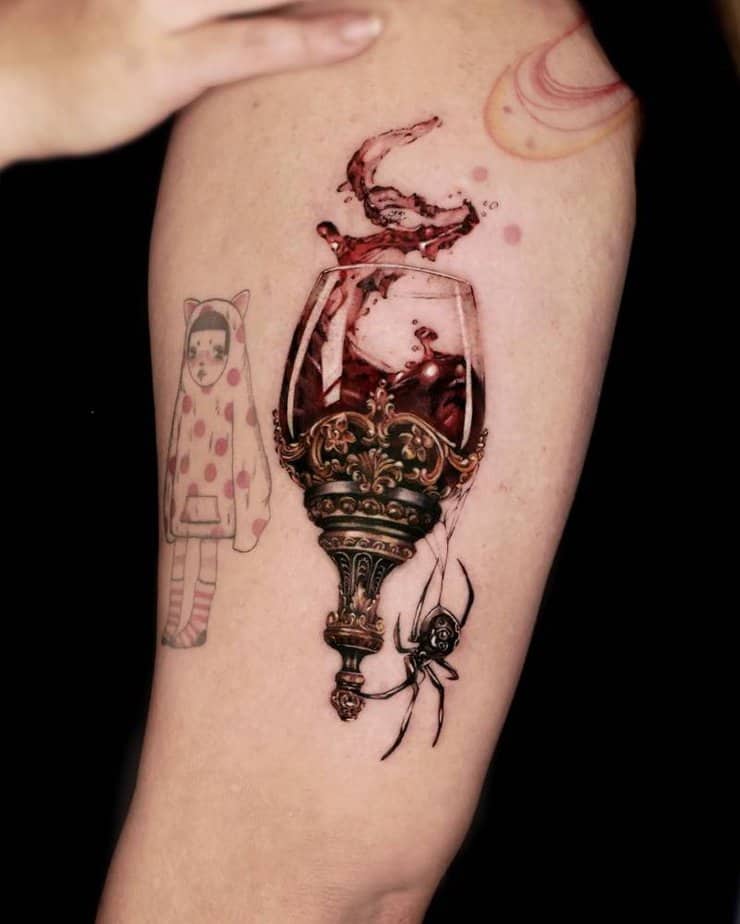 Wine glass and spider — elegant but a bit dangerous