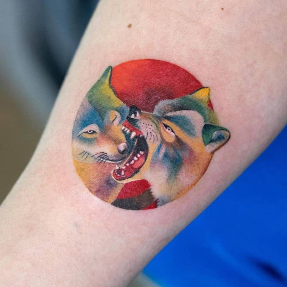 Wolves circle tattoo