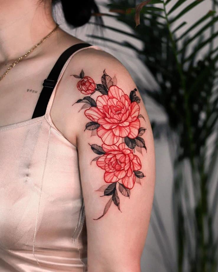 Floral shoulder tattoos